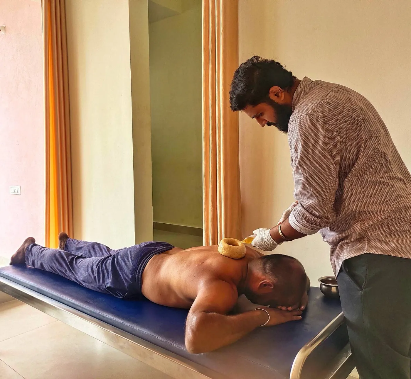 Greeva Basti being given by Dr. Rohit S. Patil